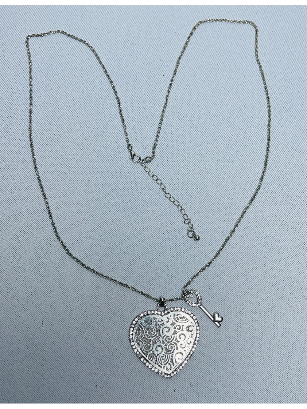 Silver Tone Heart and Key Pendant Necklace with Rhinestone Accents